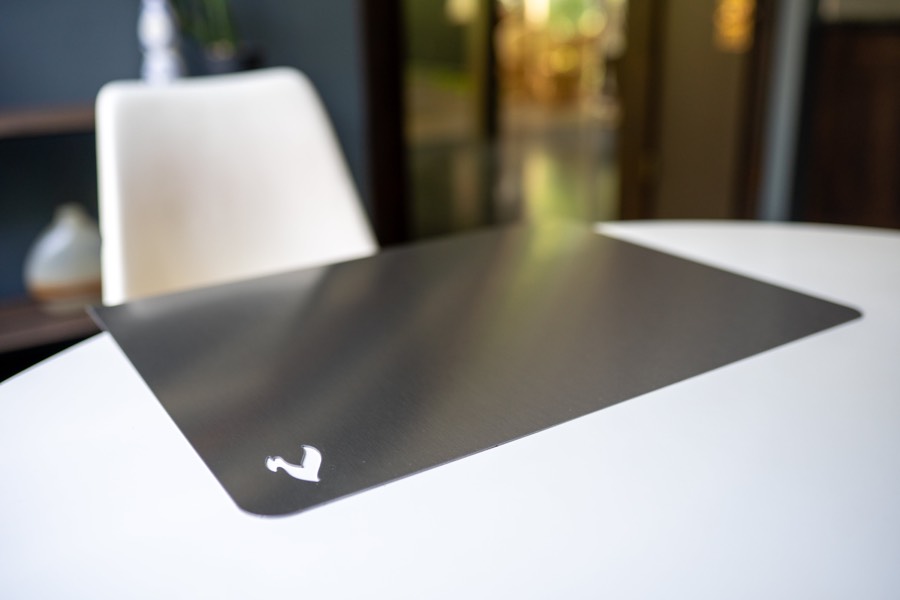 STELE Medium stainless steel board on a table